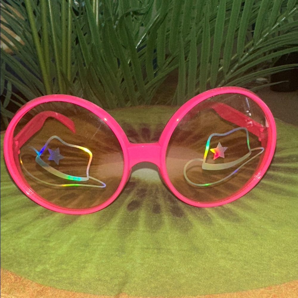 Playful Pink Sunglasses with Star and Hat Design